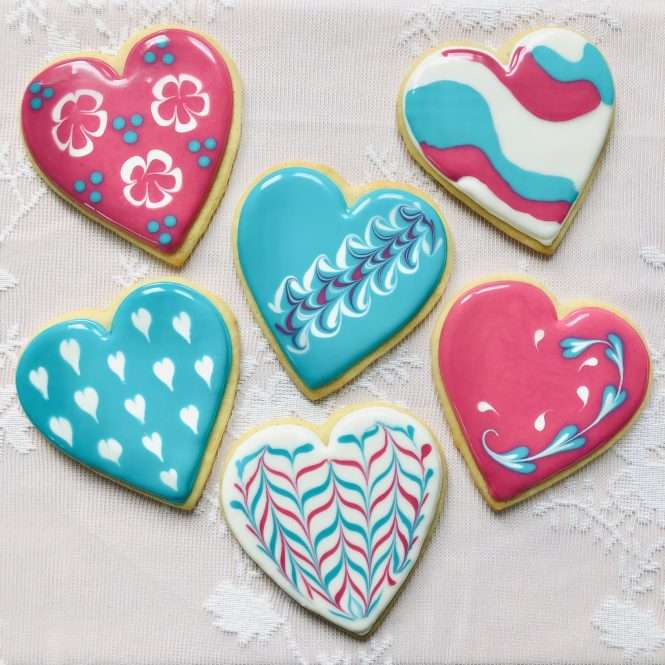 heart shaped cookies decorated for valentines day and valentines day