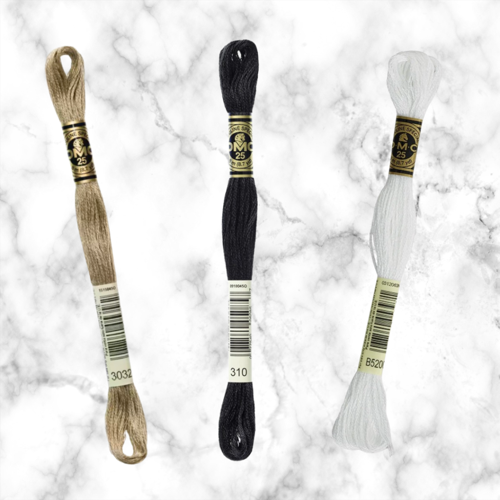 embroidery floss in mocha brown, black and Snow White