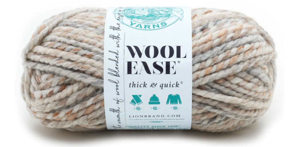 Lion brand wool ease thick and quick yarn in the color "fossil" used for dog cowl knitting pattern