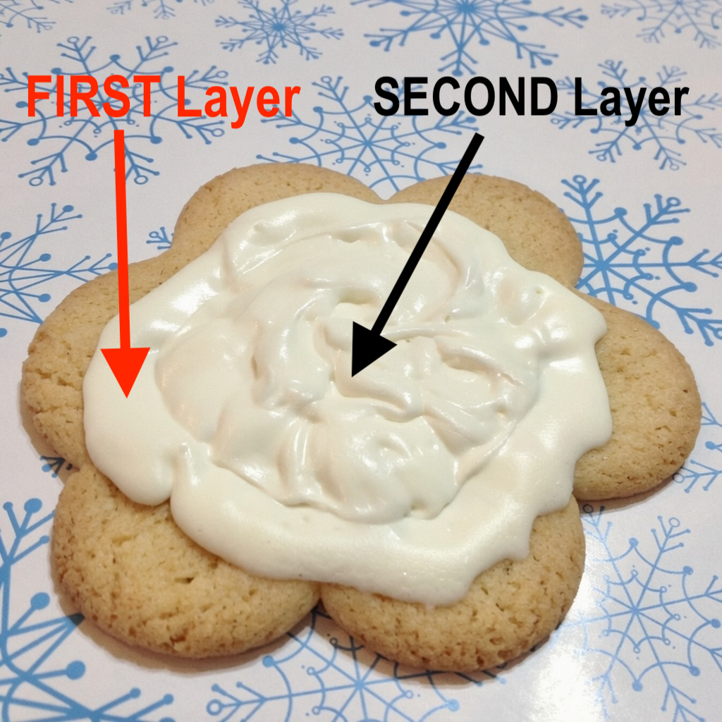 cookie with frosting on it, showing 2 layers
